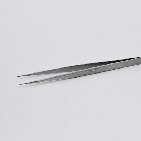 Stainless steel precision tweezers on white background